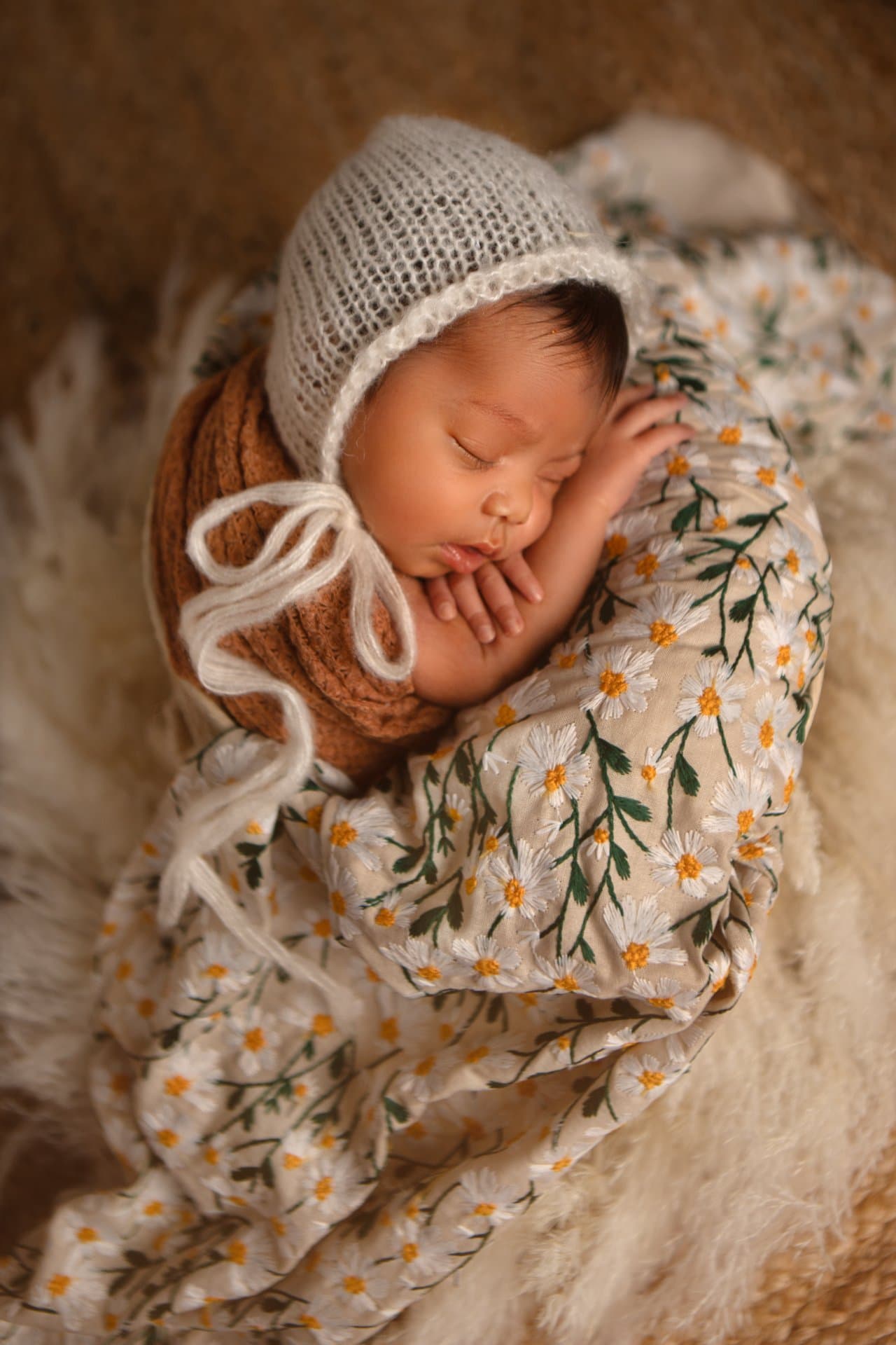 Newborn baby sleeping peacefully during a Sheffield studio photography session